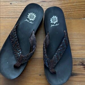 Women’s Yellow Box flip flops, size 10 with brown braided leather straps